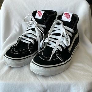 Vans high top Sk8-Hi sneaker. Women’s size 7.5. Men’s size 6. Gently worn.